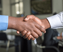 Two people shaking hands
